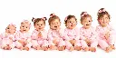 Seven Smiling Girls in Pink.png.webp