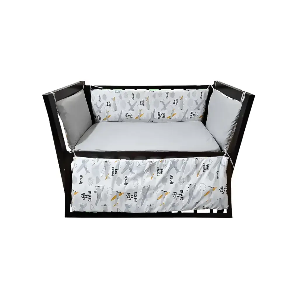 Bed sides baby moment