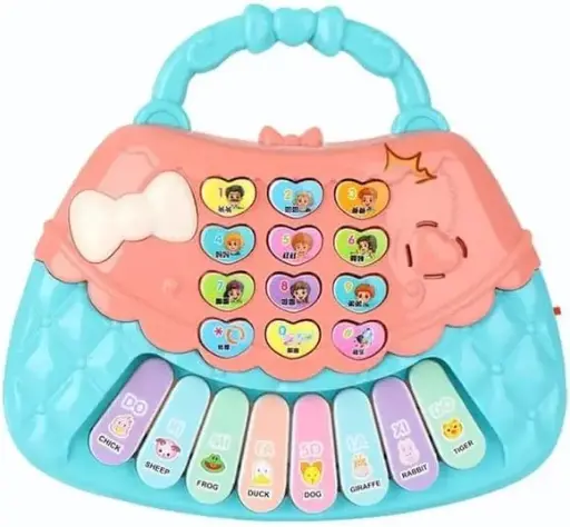 [11497] Baby piano in a cardboard bag